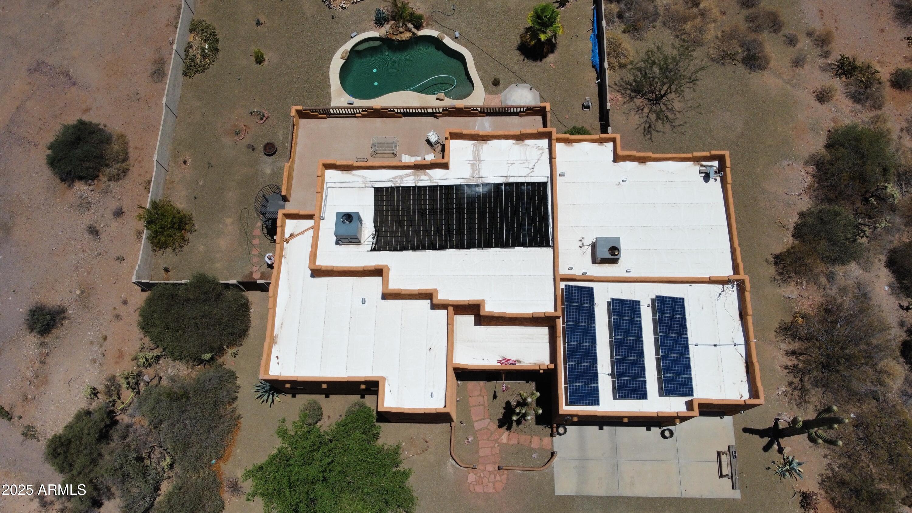 1025 North Boyd Road Apache Junction, AZ 85119 - Photo 48 of 60 an aerial view of residential houses with outdoor space