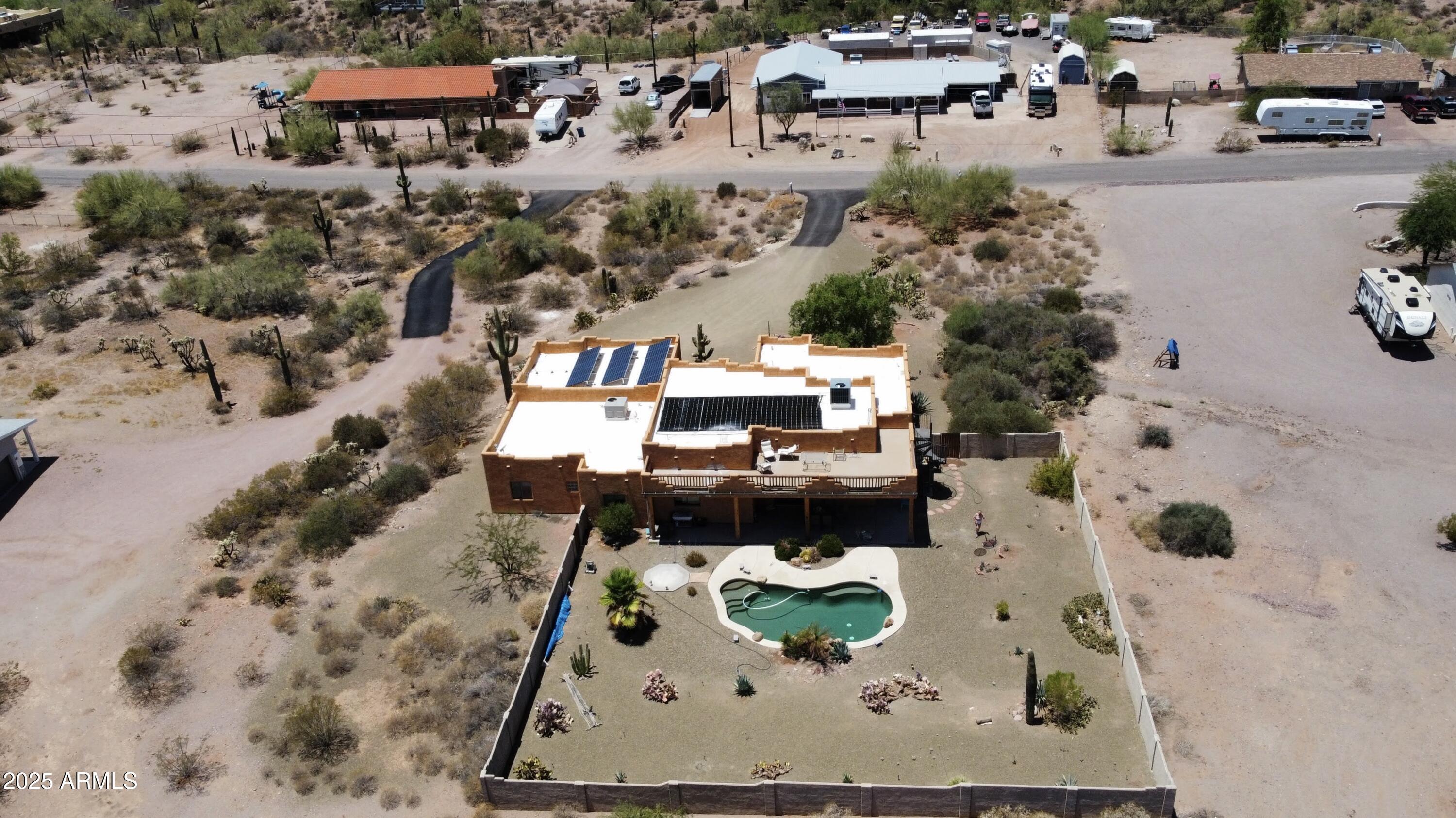 1025 North Boyd Road Apache Junction, AZ 85119 - Photo 52 of 60 an aerial view of a house with yard swimming pool and outdoor seating