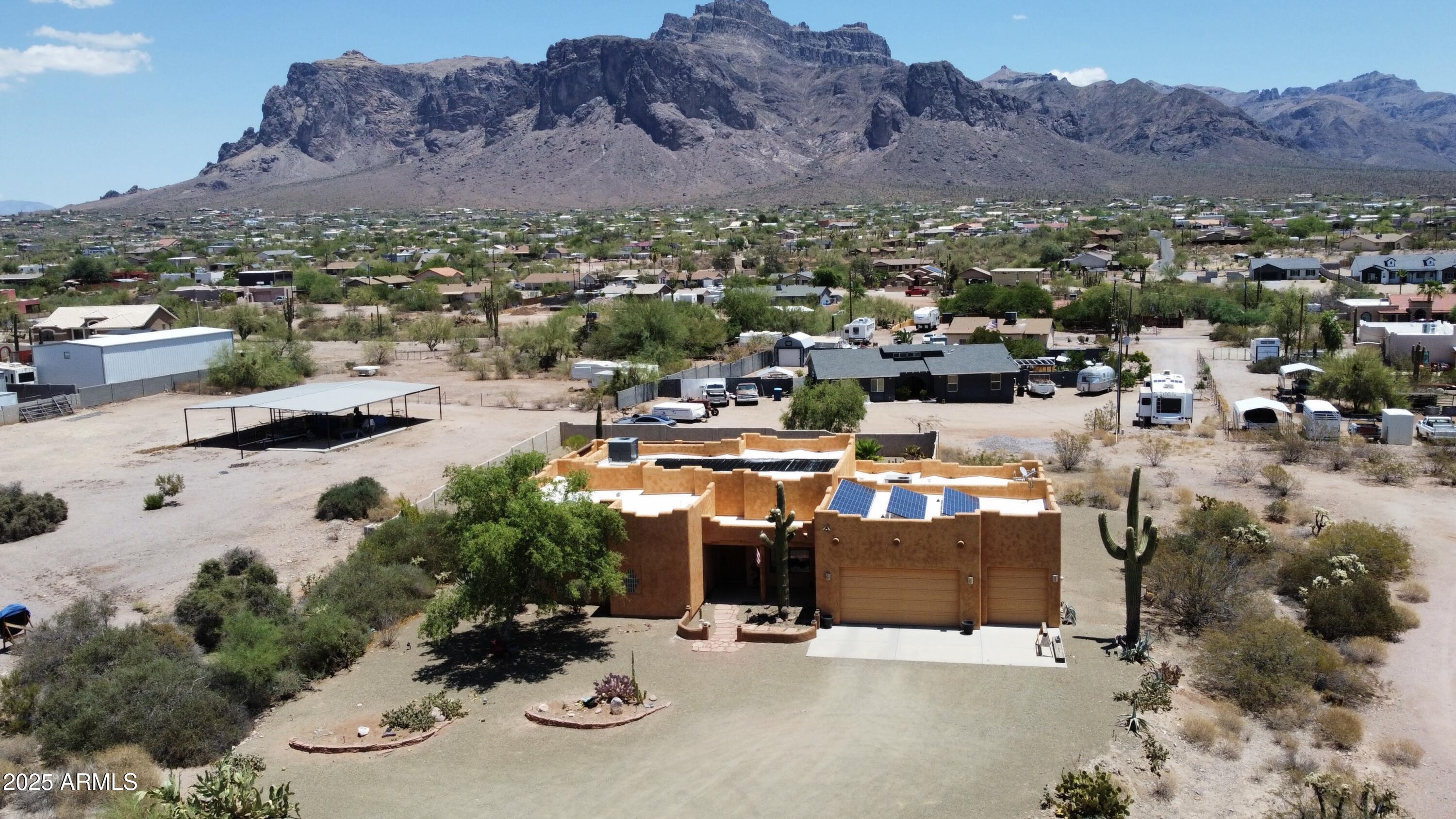 1025 North Boyd Road Apache Junction, AZ 85119 - Photo 54 of 60 a view of a houses with a outdoor space