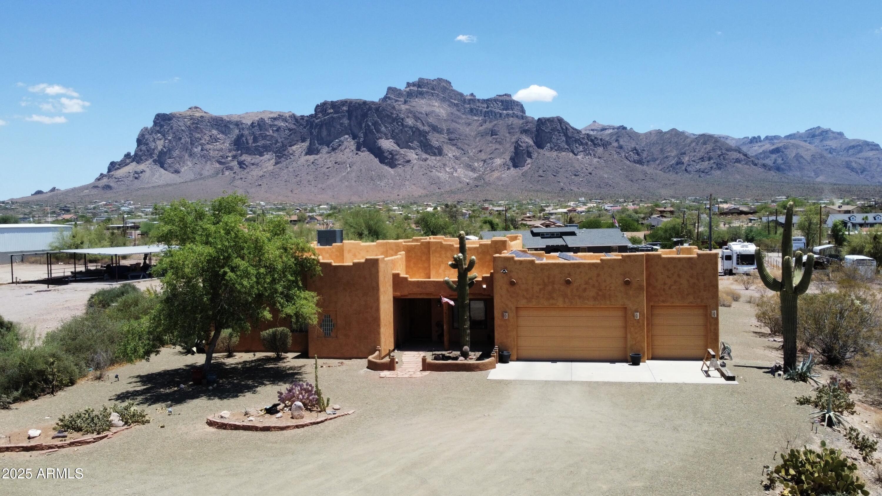 1025 North Boyd Road Apache Junction, AZ 85119 - Photo 55 of 60 an aerial view of a house with mountain view