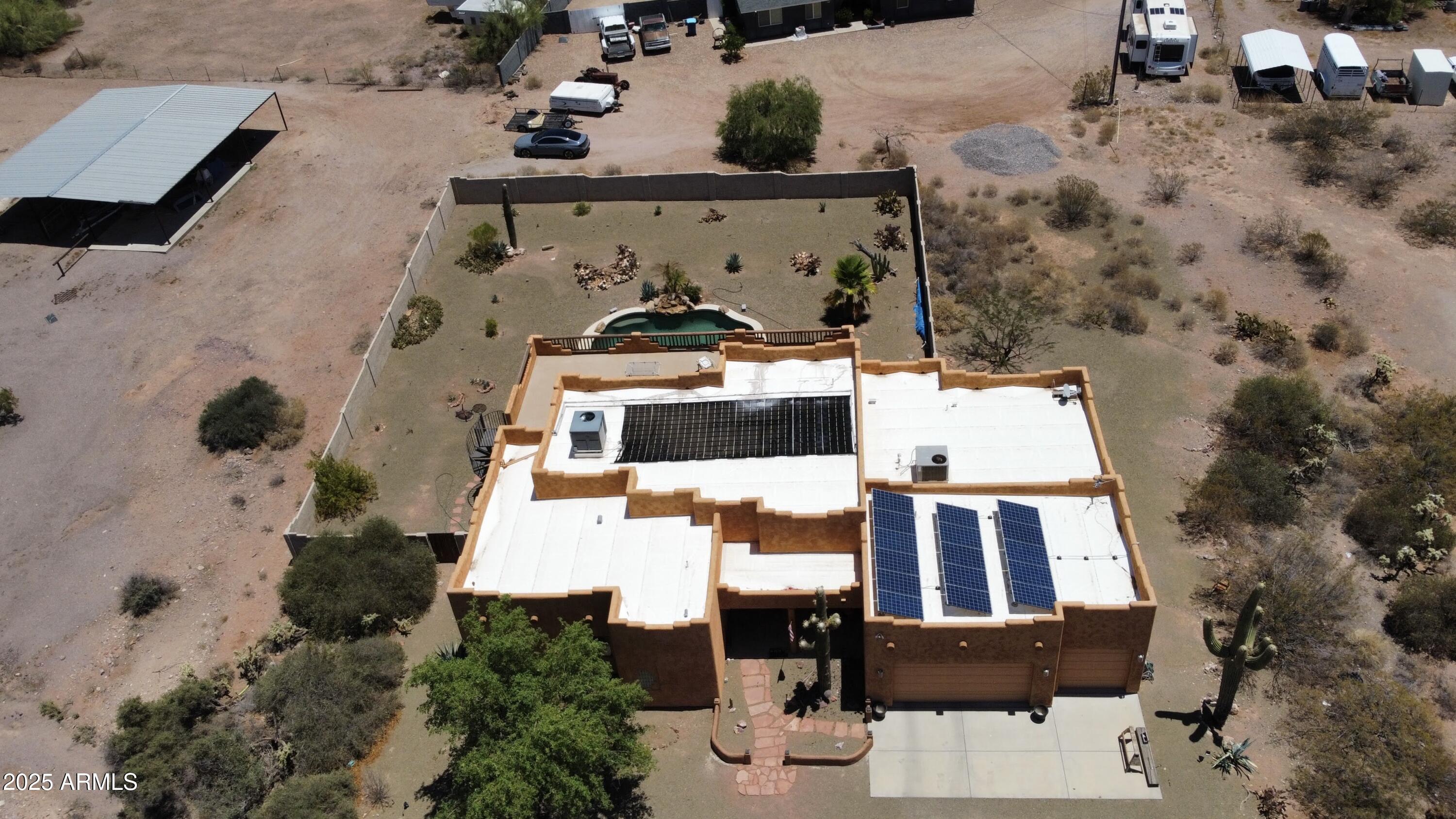 1025 North Boyd Road Apache Junction, AZ 85119 - Photo 57 of 60 an aerial view of a house with a yard