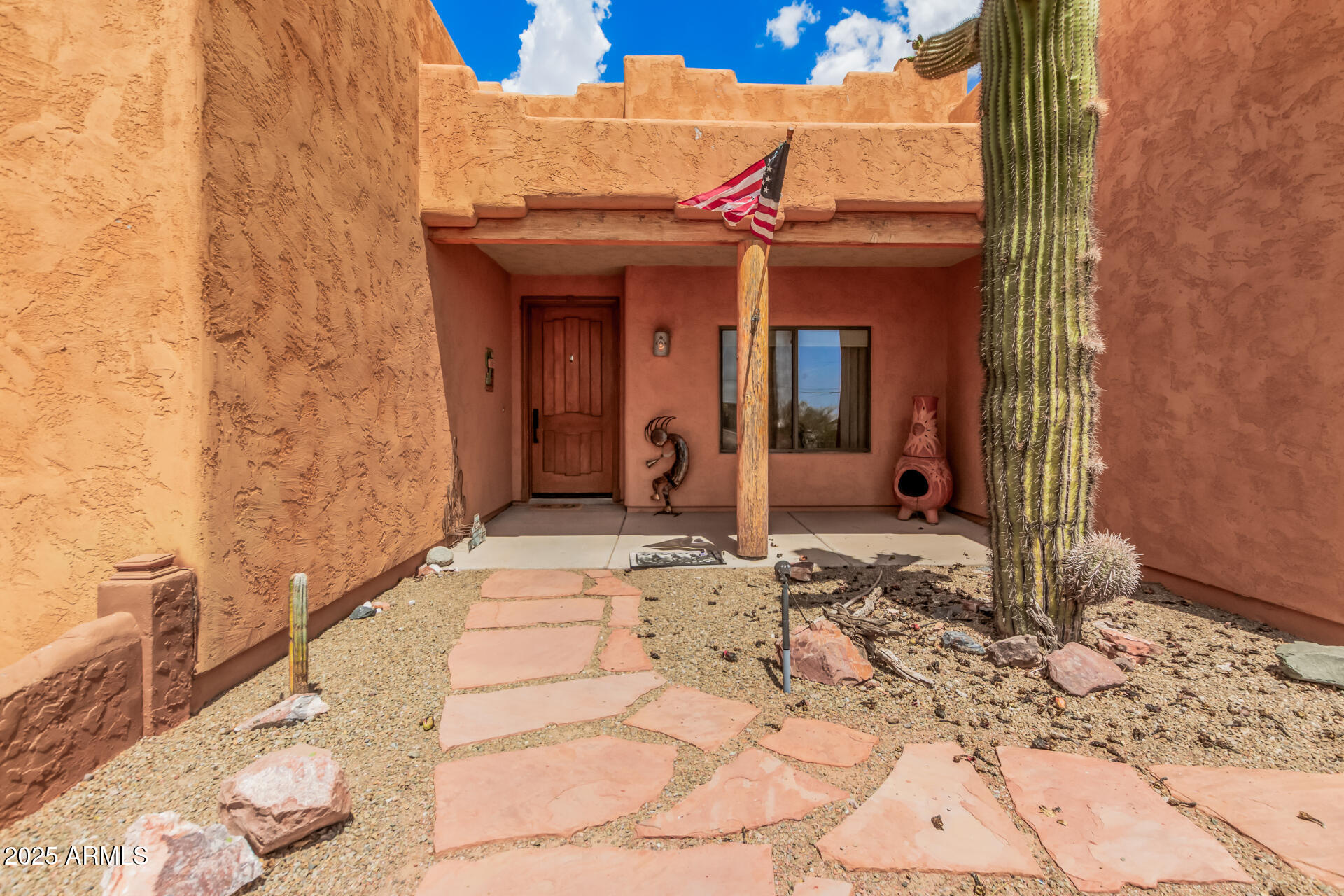 1025 North Boyd Road Apache Junction, AZ 85119 - Photo 7 of 60 a view of a entryway door front of house
