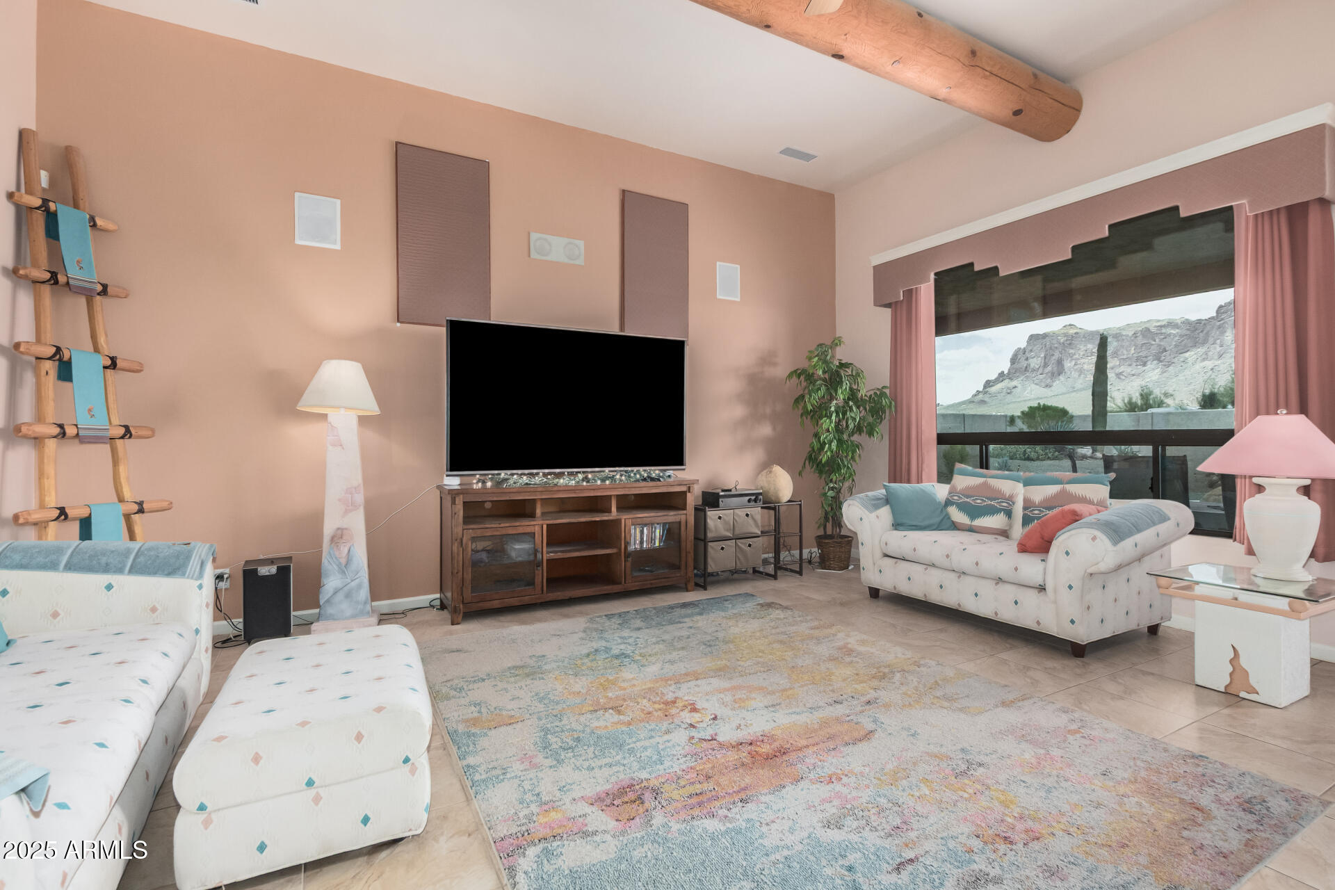 1025 North Boyd Road Apache Junction, AZ 85119 - Photo 9 of 60 a living room with furniture and a flat screen tv