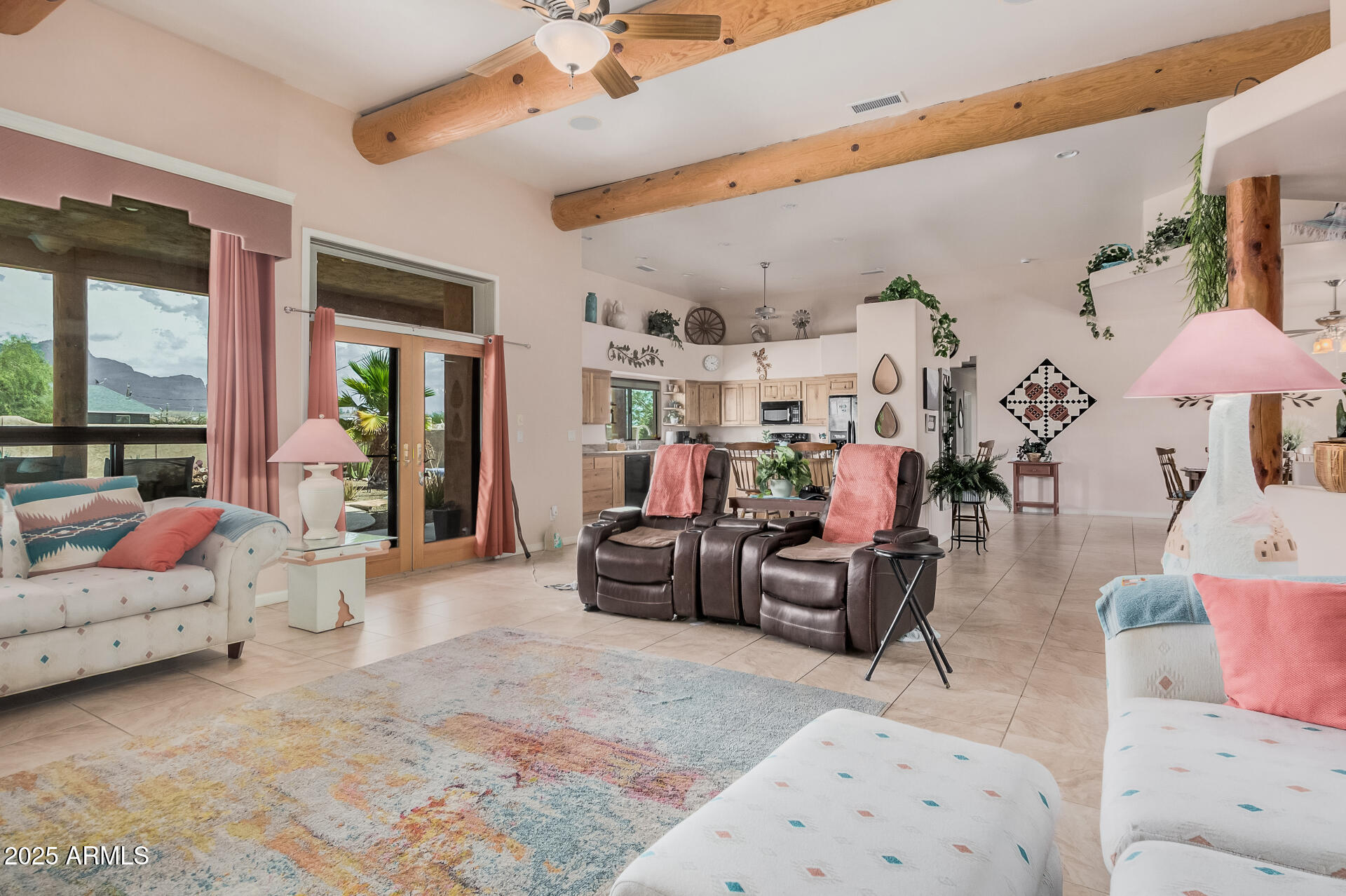 1025 North Boyd Road Apache Junction, AZ 85119 - Photo 10 of 60 a living room with furniture and a large window