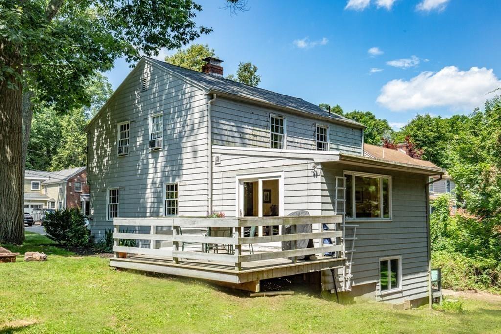 20 Oak Ridge Road Reading, MA 01867 - Photo 3 of 22 a view of house with a yard and sitting area