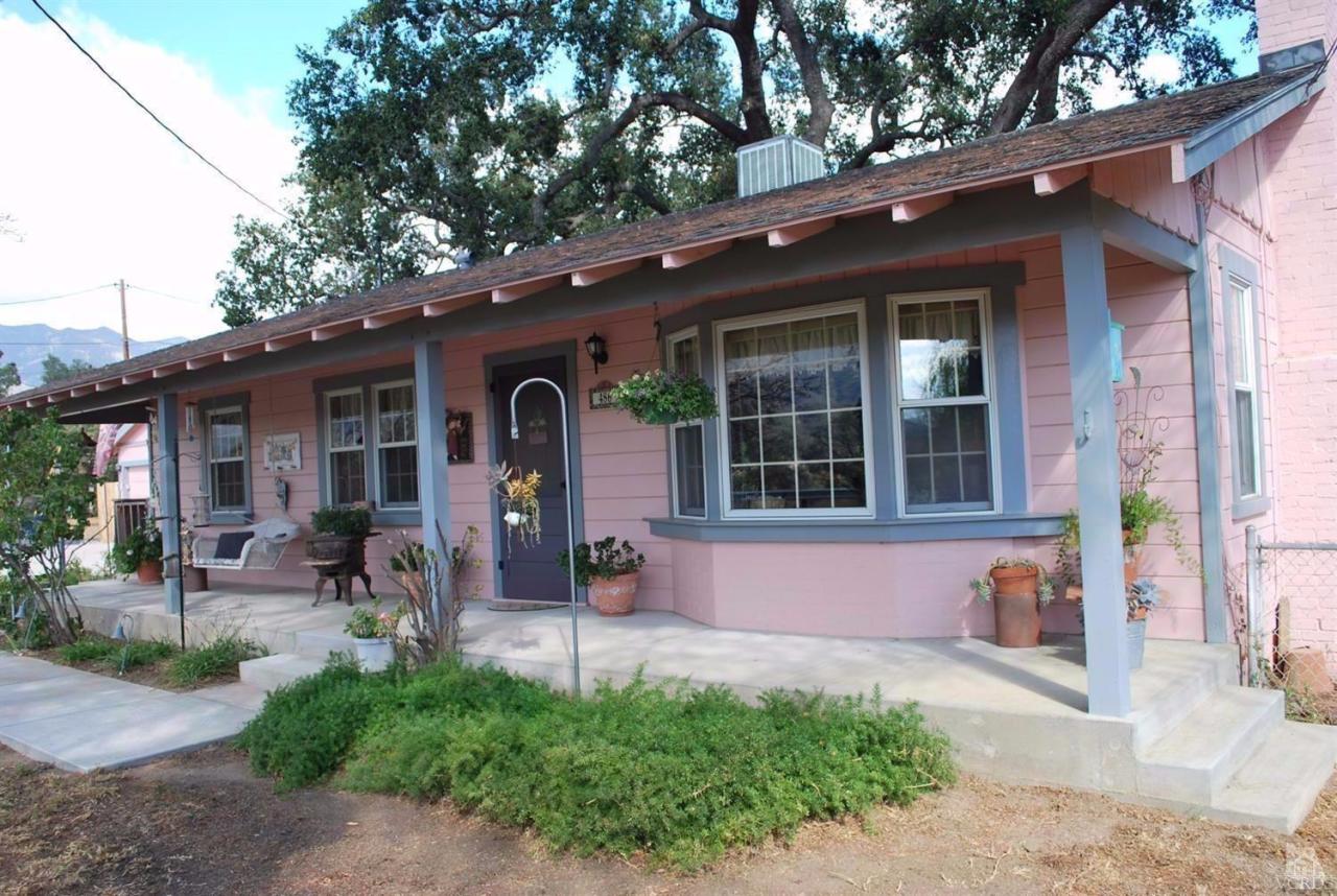 a front view of a house with patio