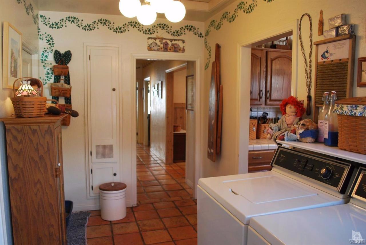 486 South Rice Road Ojai, CA 93023 - Photo 14 of 48 a room with furniture and wooden floor