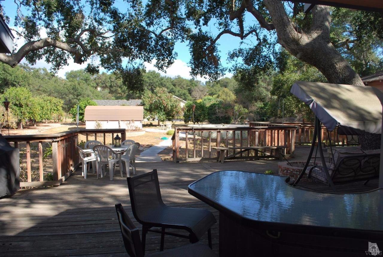 486 South Rice Road Ojai, CA 93023 - Photo 16 of 48 a view of a chairs and table on the wooden floor