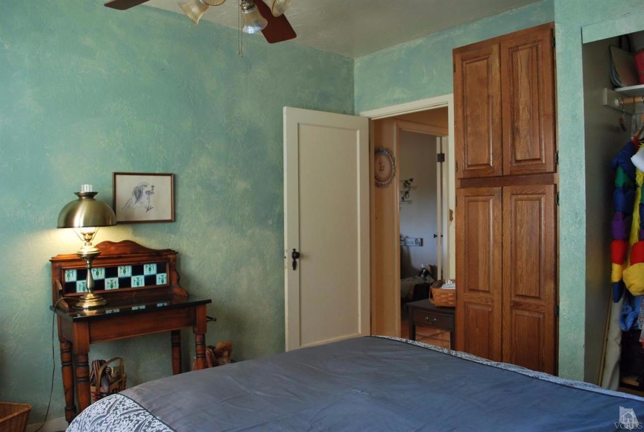 486 South Rice Road Ojai, CA 93023 - Photo 24 of 48 a bedroom with a bed and a tv on table