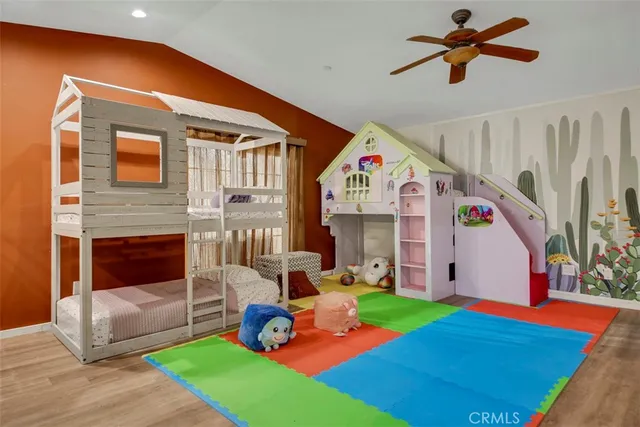 a front view of house with yard and slide