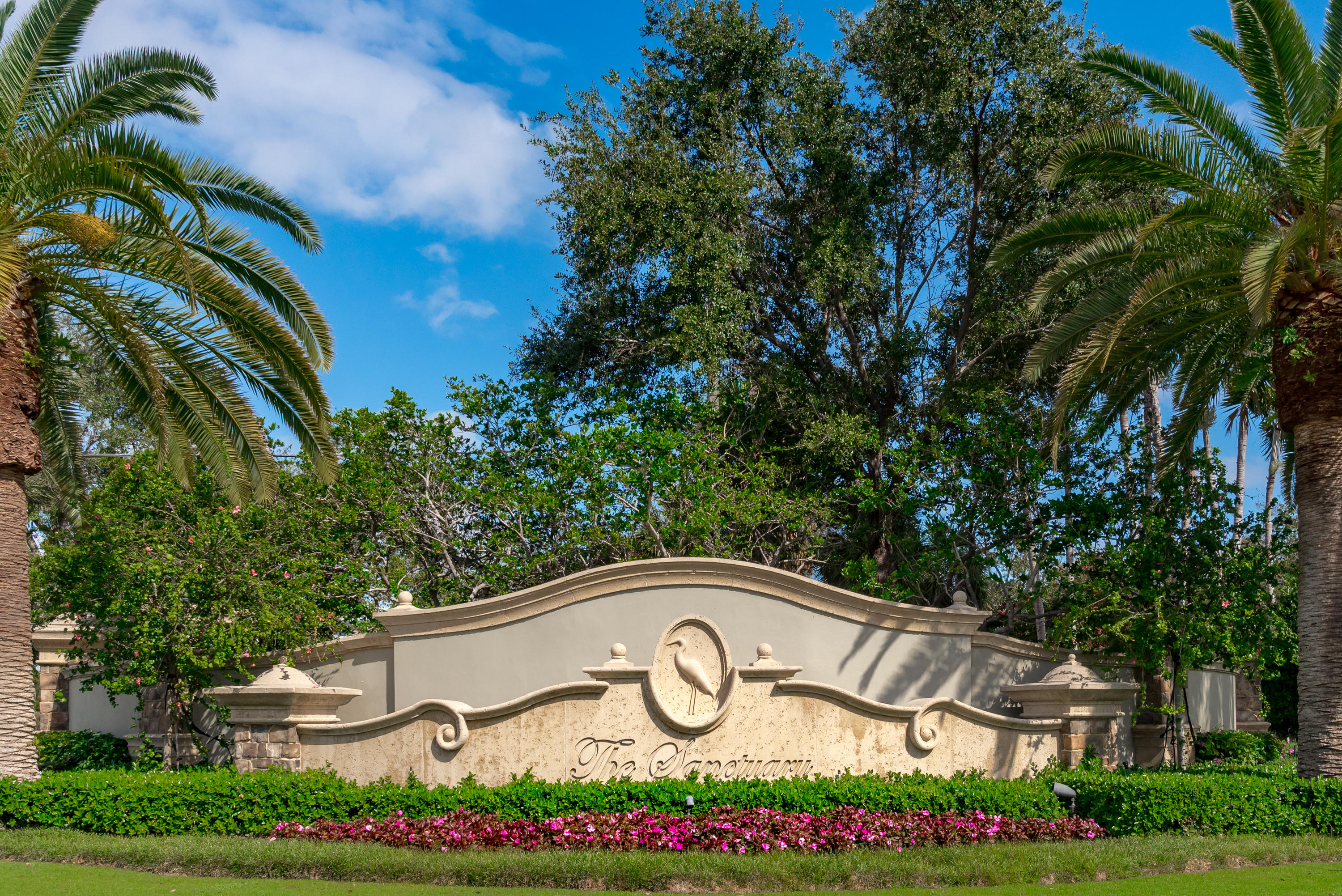 651 Northeast 45th Road Boca Raton, FL 33431 - Photo 22 of 23 a view of sign board with flower around