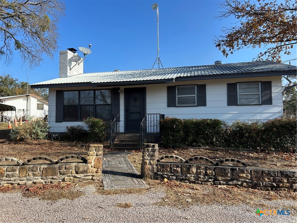 109 County Road 138B Burnet, TX 78611 - Photo 1 of 1 a front view of a house with garden