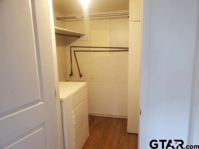 a bathroom with a shower and a sink
