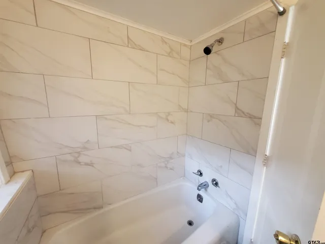 a bathroom with a bathtub
