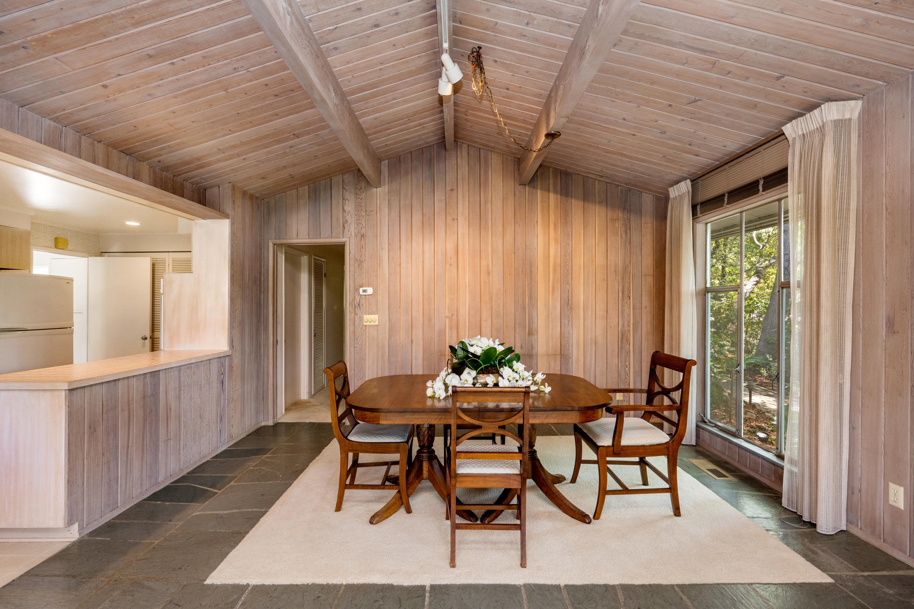 939 Mission Ridge Road Santa Barbara, CA 93103 - Photo 5 of 14 a dining room with furniture and wooden floor