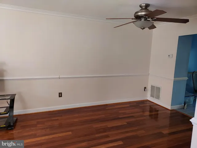 a view of a room with an empty space