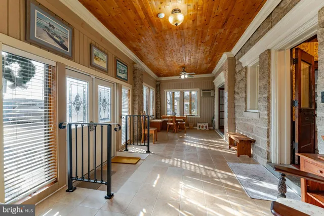 a view of a lobby with furniture and floor to ceiling window