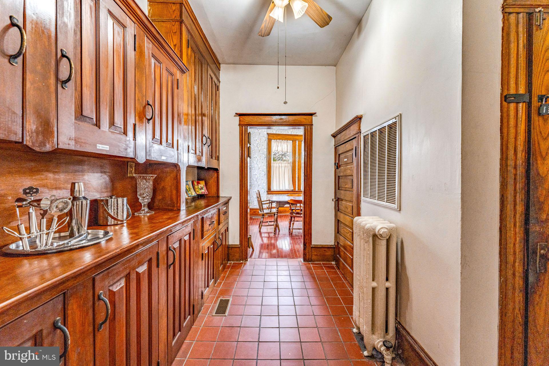 825 Bay Avenue Somers Point, NJ 08244 - Photo 10 of 37 a view of a hallway with wooden floors and stairs
