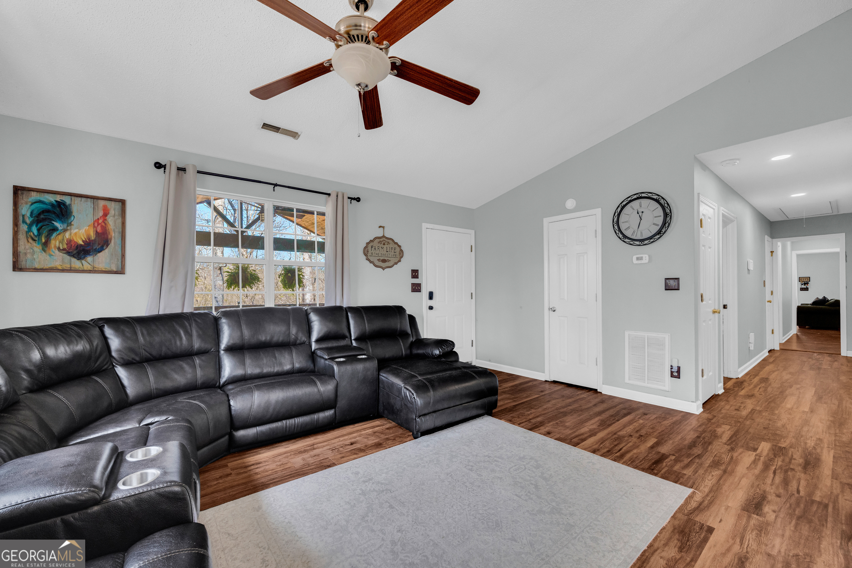 234 Old River Road Cornelia, GA 30531 - Photo 11 of 40 a living room with furniture and a window