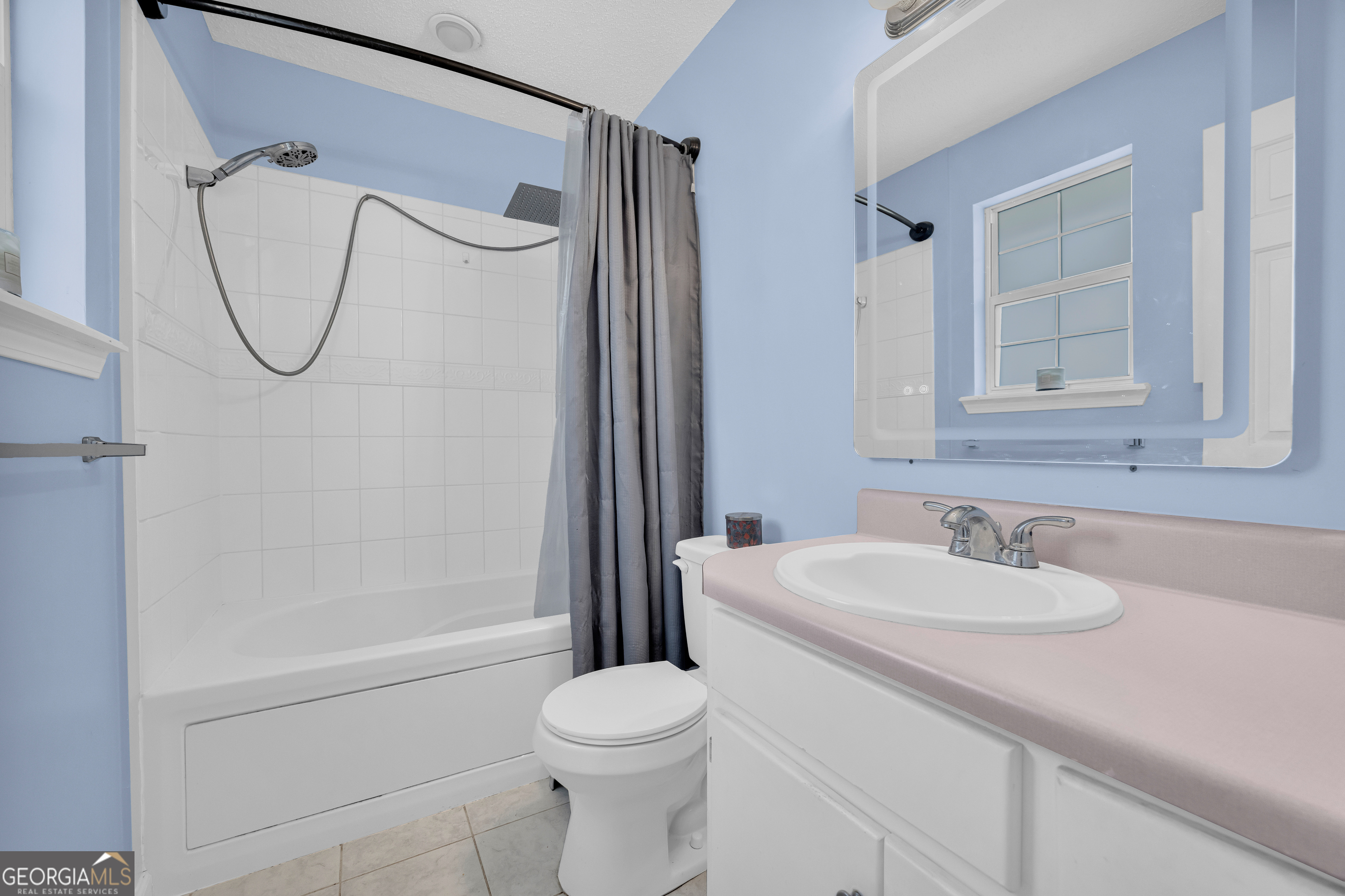 234 Old River Road Cornelia, GA 30531 - Photo 20 of 40 a bathroom with a sink a toilet and a mirror