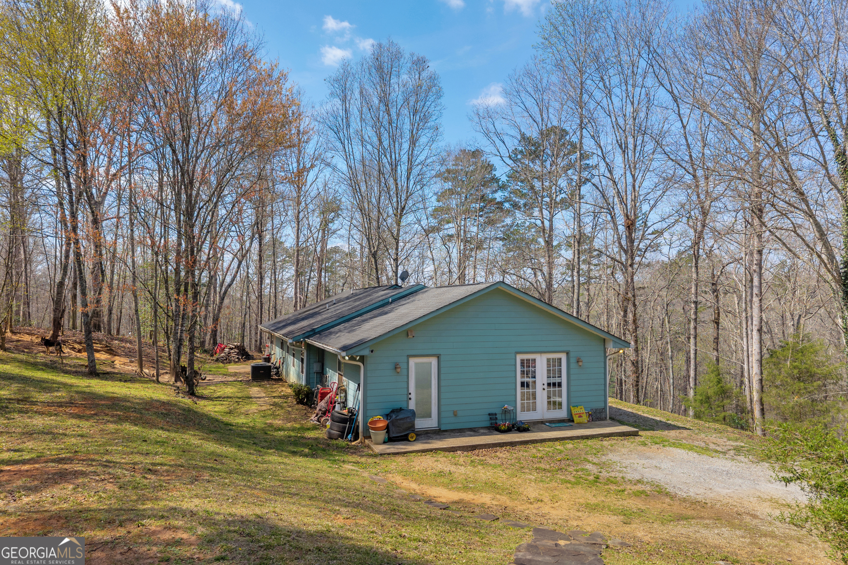 234 Old River Road Cornelia, GA 30531 - Photo 2 of 40 a view of a house with yard and trees in the background