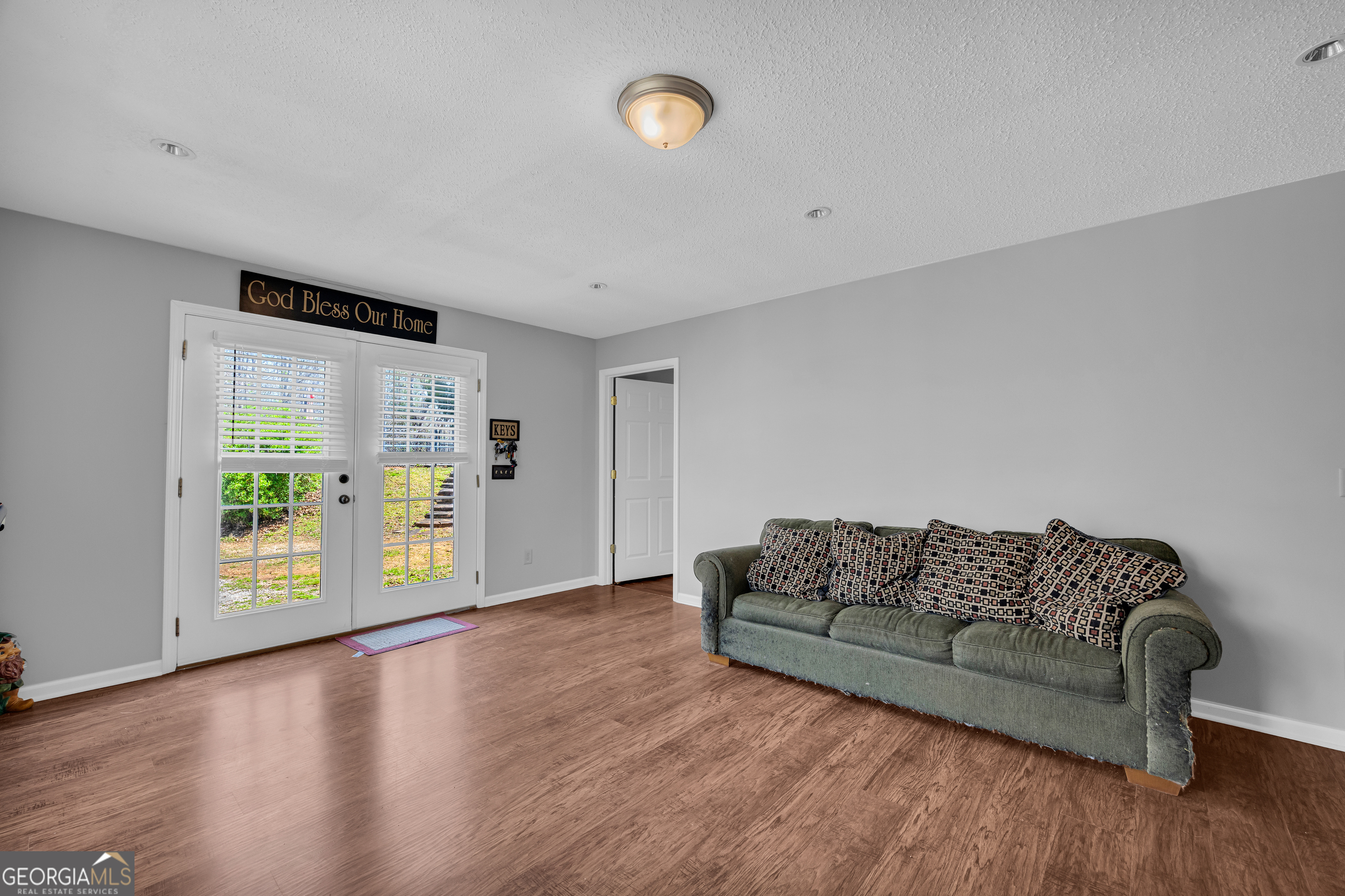 234 Old River Road Cornelia, GA 30531 - Photo 30 of 40 a living room with furniture and a window