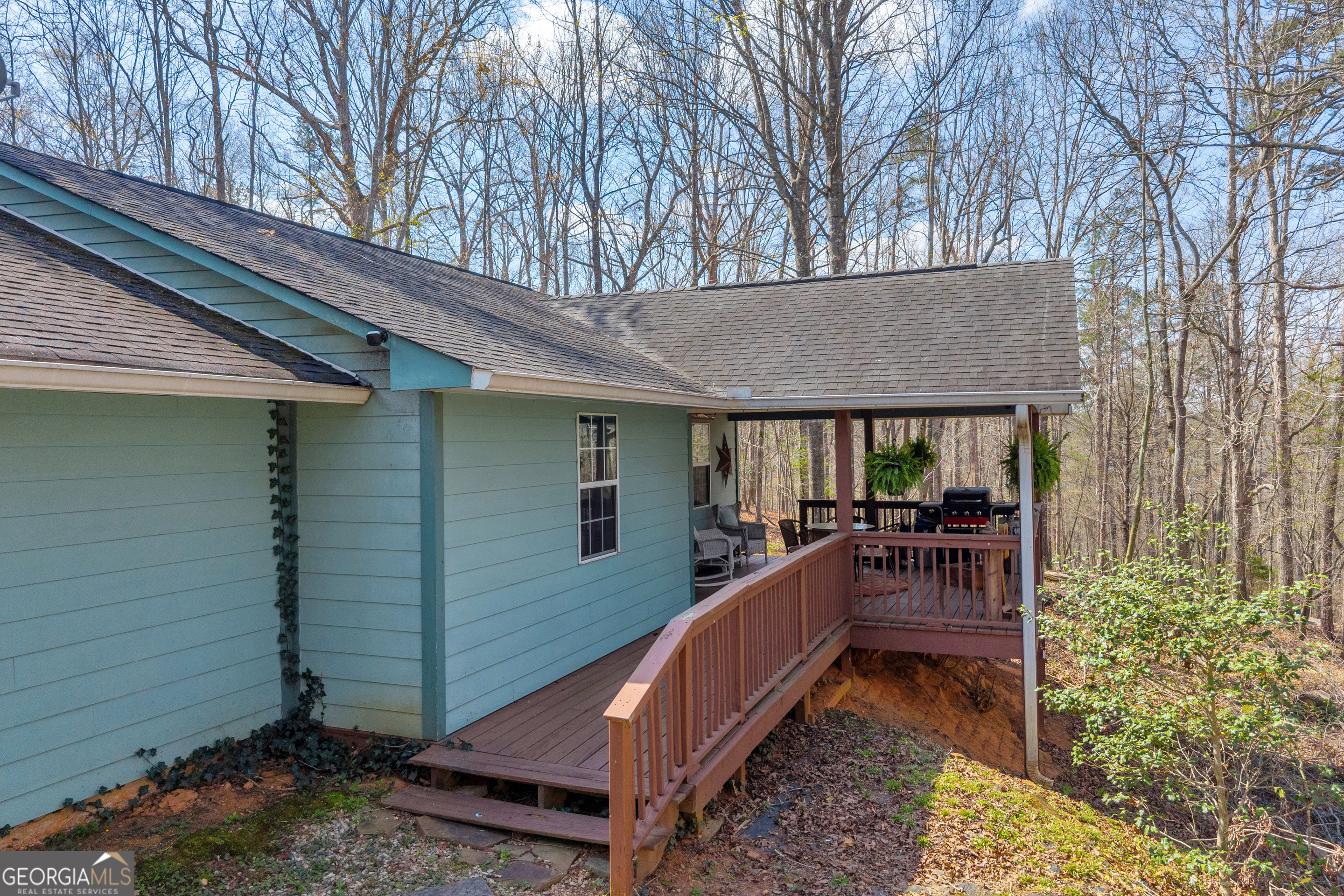 234 Old River Road Cornelia, GA 30531 - Photo 5 of 40 a view of house with backyard and seating area