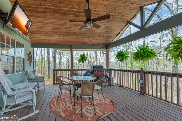 a view of a patio with furniture