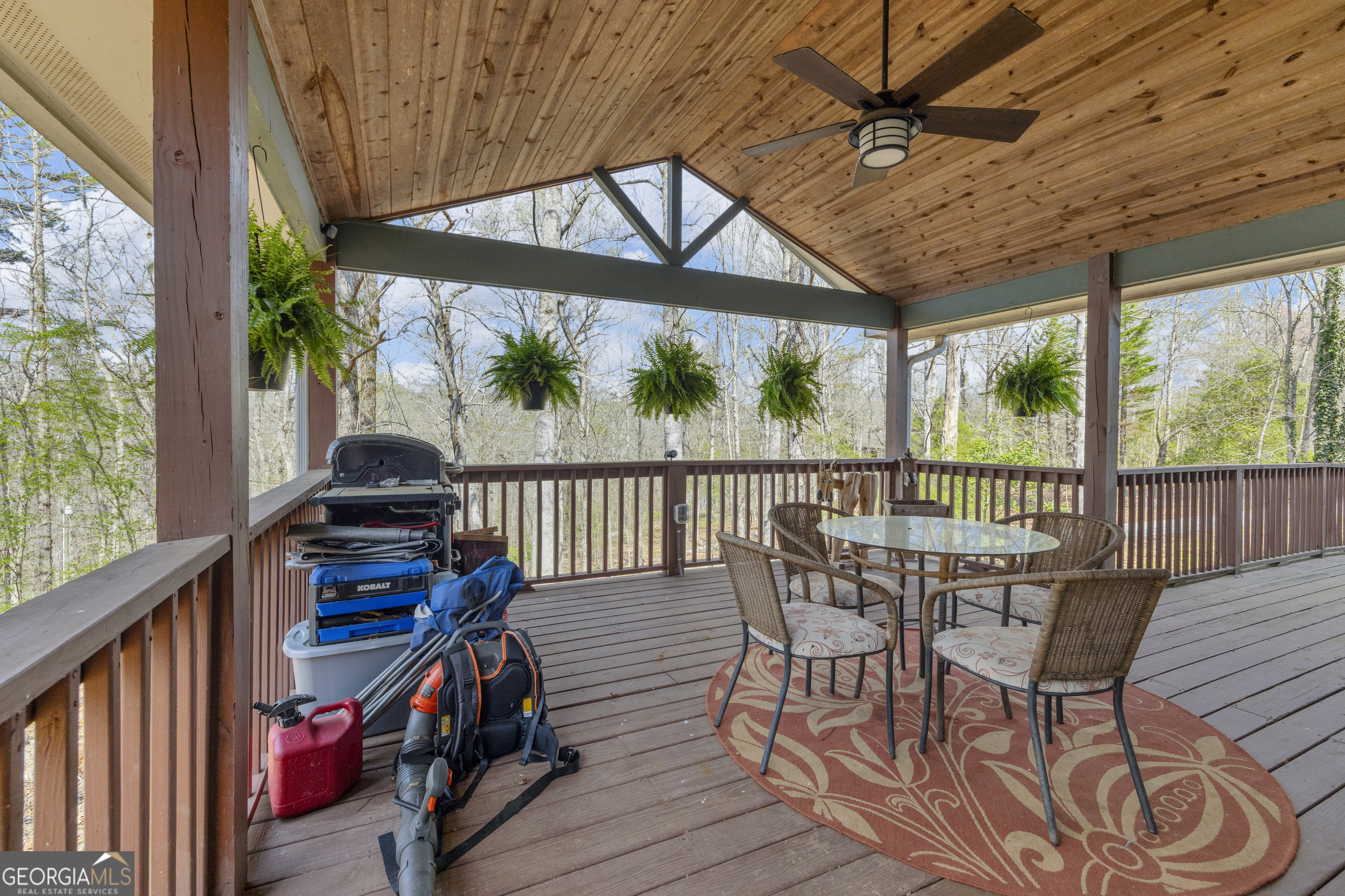 234 Old River Road Cornelia, GA 30531 - Photo 8 of 40 a view of a chairs and table in the balcony