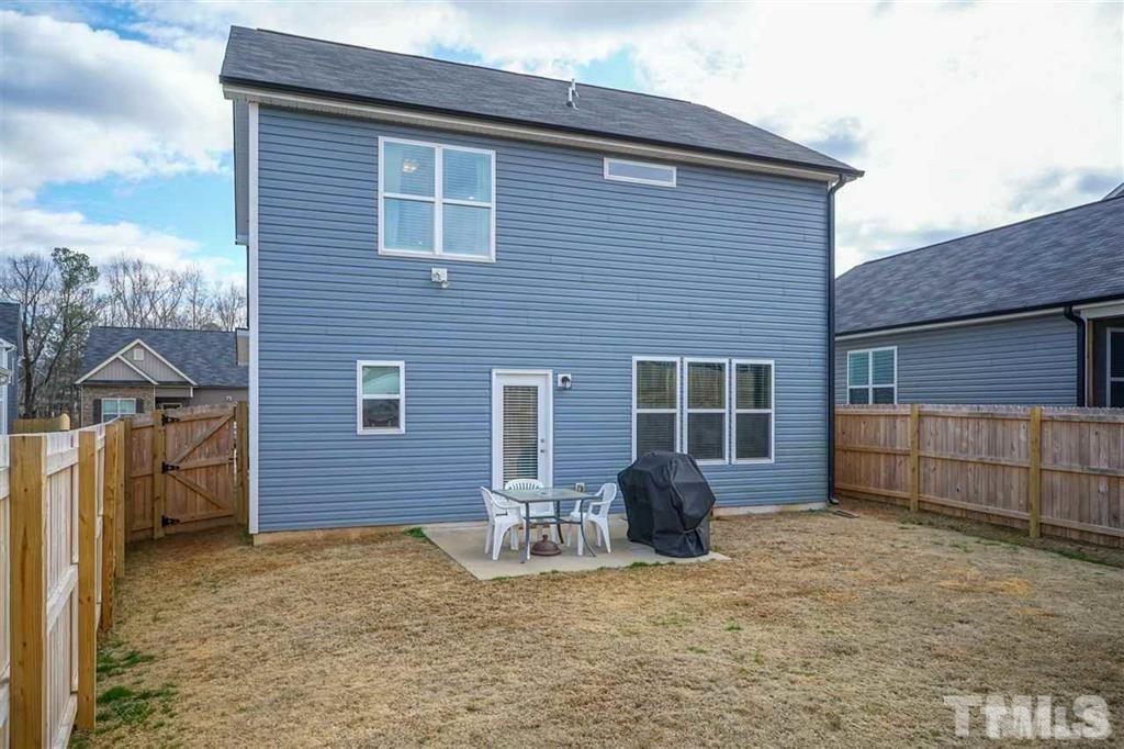42 Griffith Place Clayton, NC 27520 - Photo 23 of 26 a view of a house with a yard