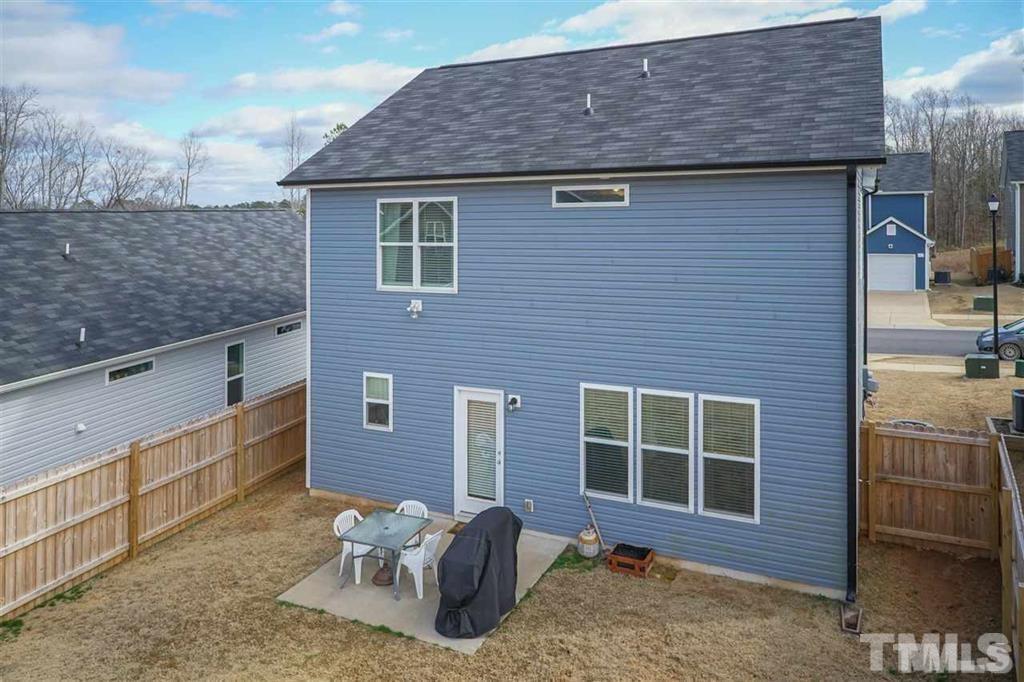 42 Griffith Place Clayton, NC 27520 - Photo 25 of 26 a front view of a house with a yard