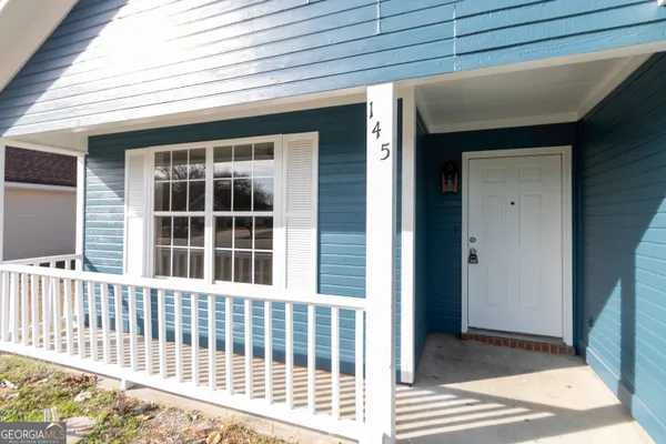 a view of a balcony with a window