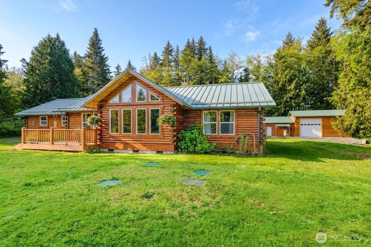 134 Bishop Road Port Angeles, WA 98363 - Photo 28 of 38 a front view of a house with a garden