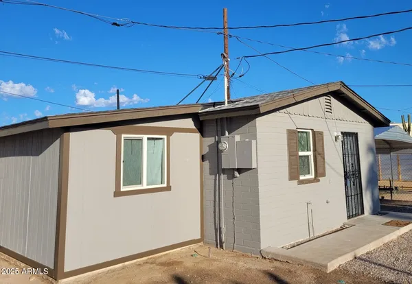 a front view of a house with garage