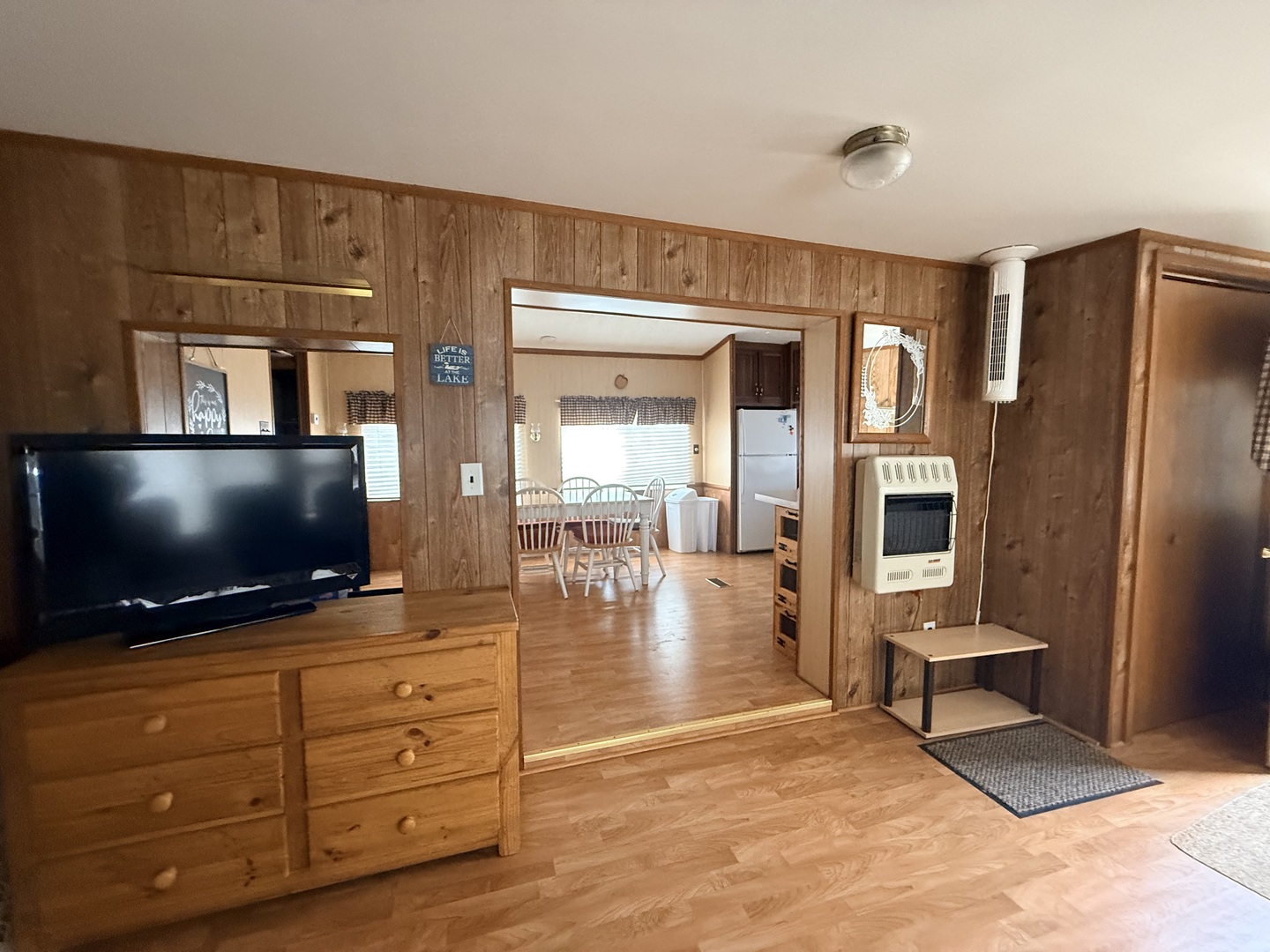 3-166 Woodhaven Lakes Sublette, IL 61367 - Photo 11 of 20 a living room with furniture and a flat screen tv
