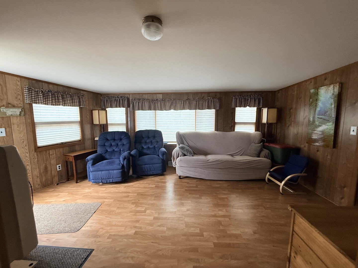 3-166 Woodhaven Lakes Sublette, IL 61367 - Photo 13 of 20 a living room with furniture window and a flat screen tv