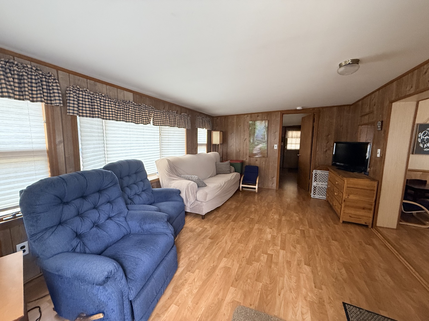 3-166 Woodhaven Lakes Sublette, IL 61367 - Photo 14 of 20 a living room with a couch and a flat screen tv