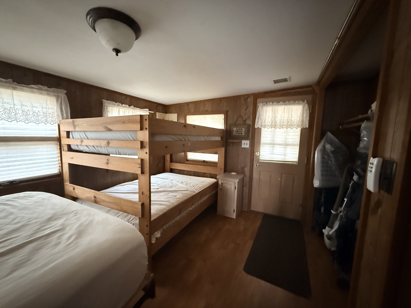 3-166 Woodhaven Lakes Sublette, IL 61367 - Photo 17 of 20 a bedroom with a bed and large window