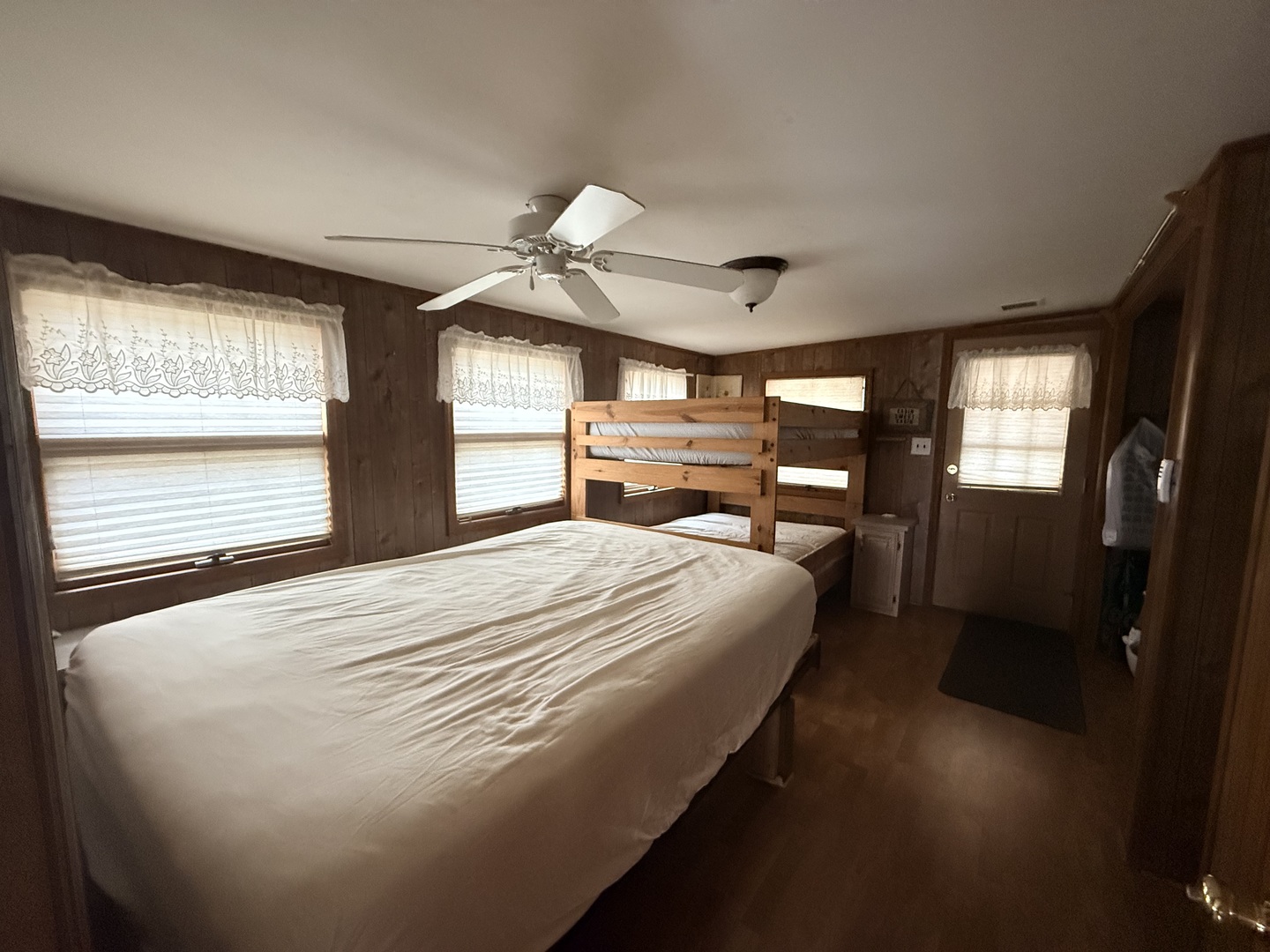 3-166 Woodhaven Lakes Sublette, IL 61367 - Photo 18 of 20 a bedroom with a bed and a large window