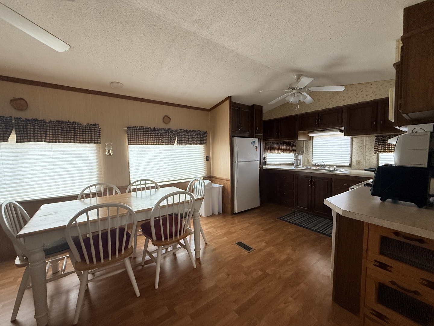 3-166 Woodhaven Lakes Sublette, IL 61367 - Photo 7 of 20 a view of a dining room with furniture window and wooden floor
