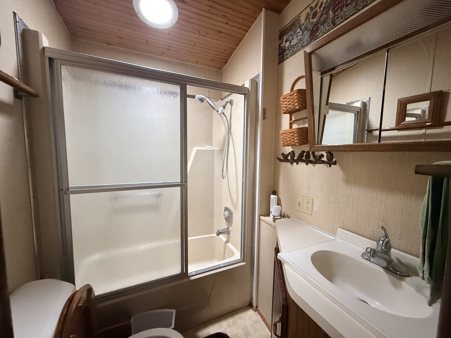3-166 Woodhaven Lakes Sublette, IL 61367 - Photo 10 of 20 a bathroom with a tub sink and mirror