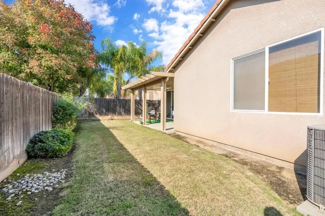 a house with trees in front of it
