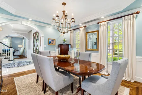 a bathroom with a sink toilet and mirror