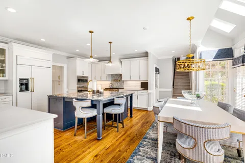 a living room with fireplace furniture and a fireplace