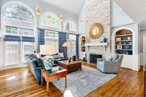 a bed room with a bed and a chair