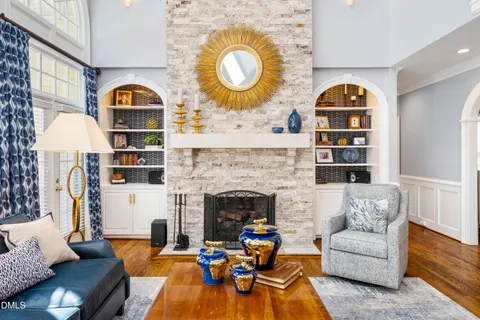 a bath tub sitting in a bathroom next to a window