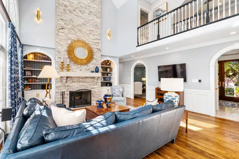 a bathroom with cabinets a sink and a mirror
