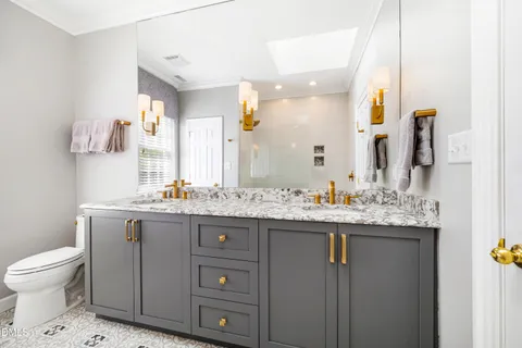 a view of a patio with table and chairs with wooden floor