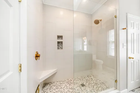 a view of a house with swimming pool and sitting area