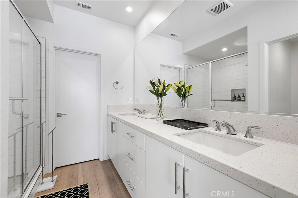 1826 West Bushell Street Anaheim, CA 92805 - Photo 20 of 30 a bathroom with a sink and a mirror